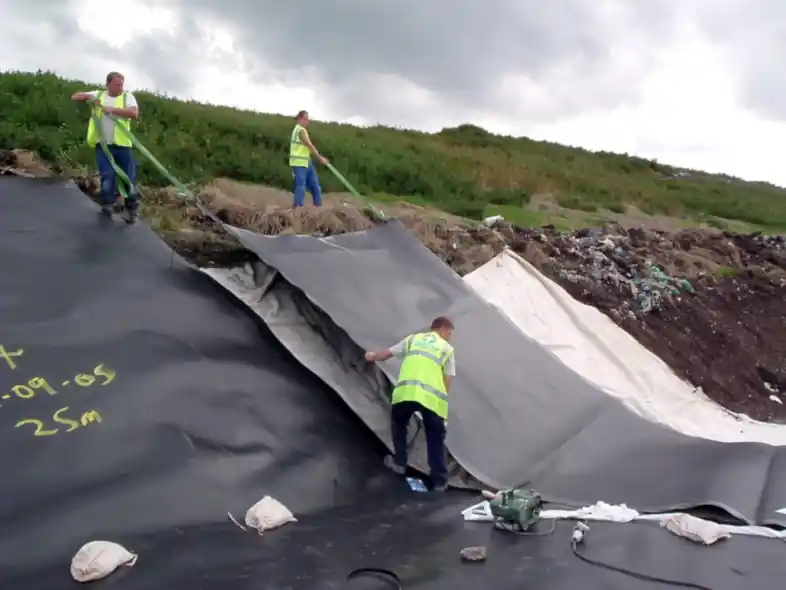 Image shows a landfill lining plastic membrane problem solved.